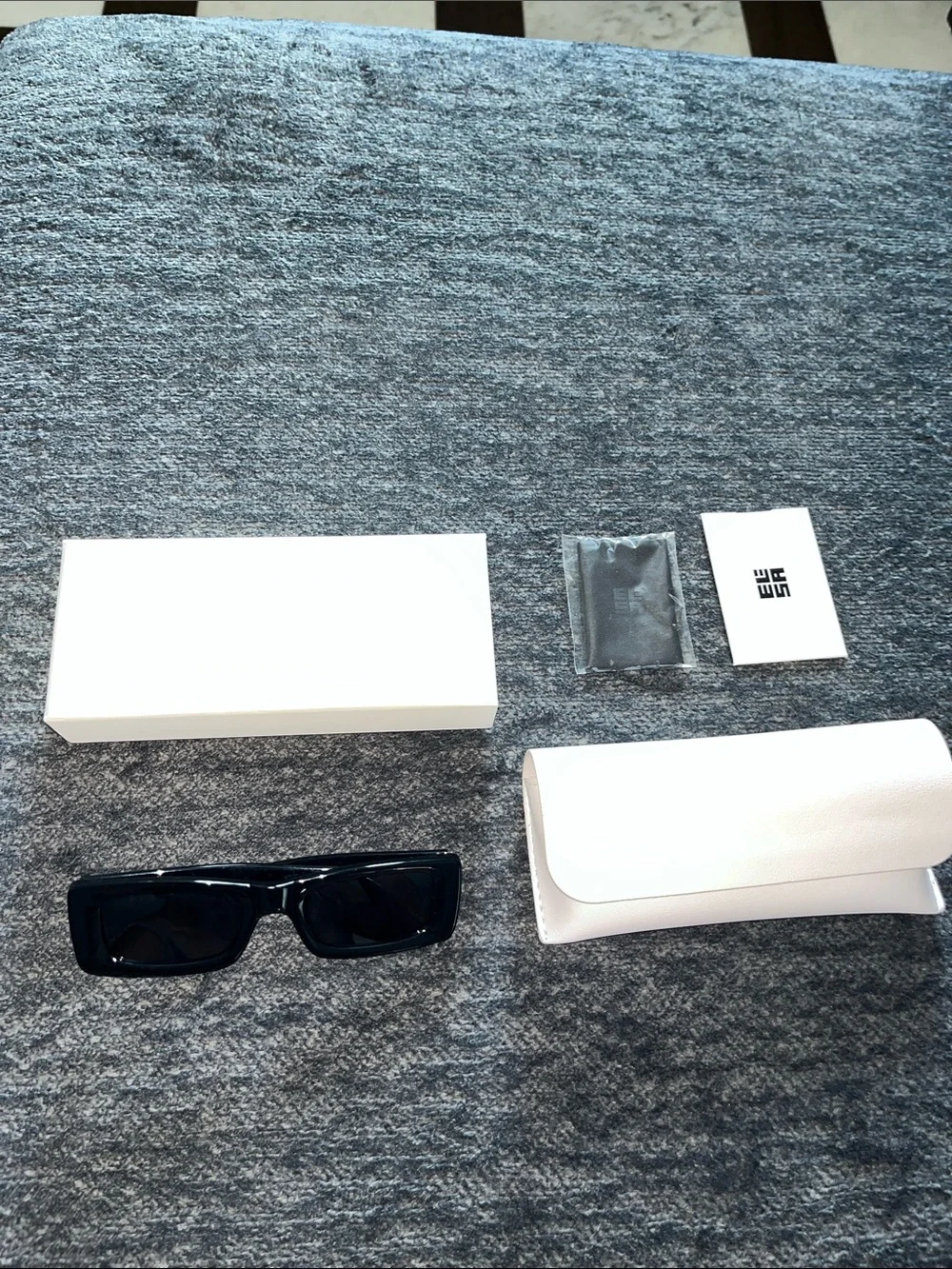 Black Rectangular Women's Sunglasses with White Case